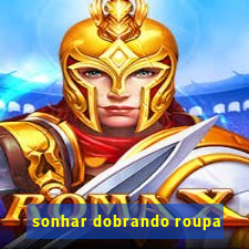 sonhar dobrando roupa