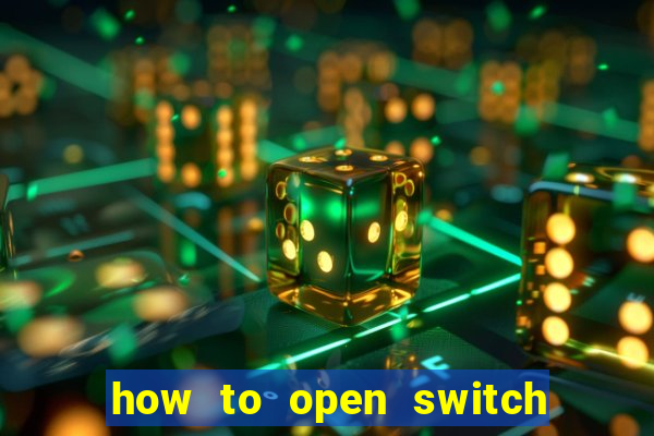 how to open switch oled game card slot