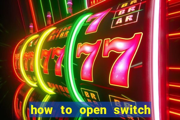 how to open switch oled game card slot